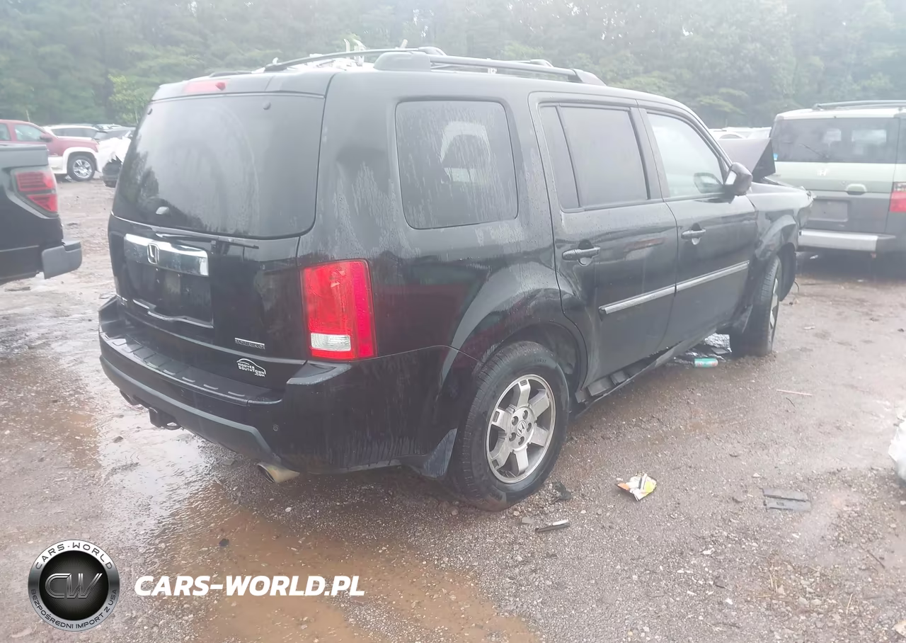 2011 Honda Pilot Touring VIN:5FNYF3H98BB030714 - 4