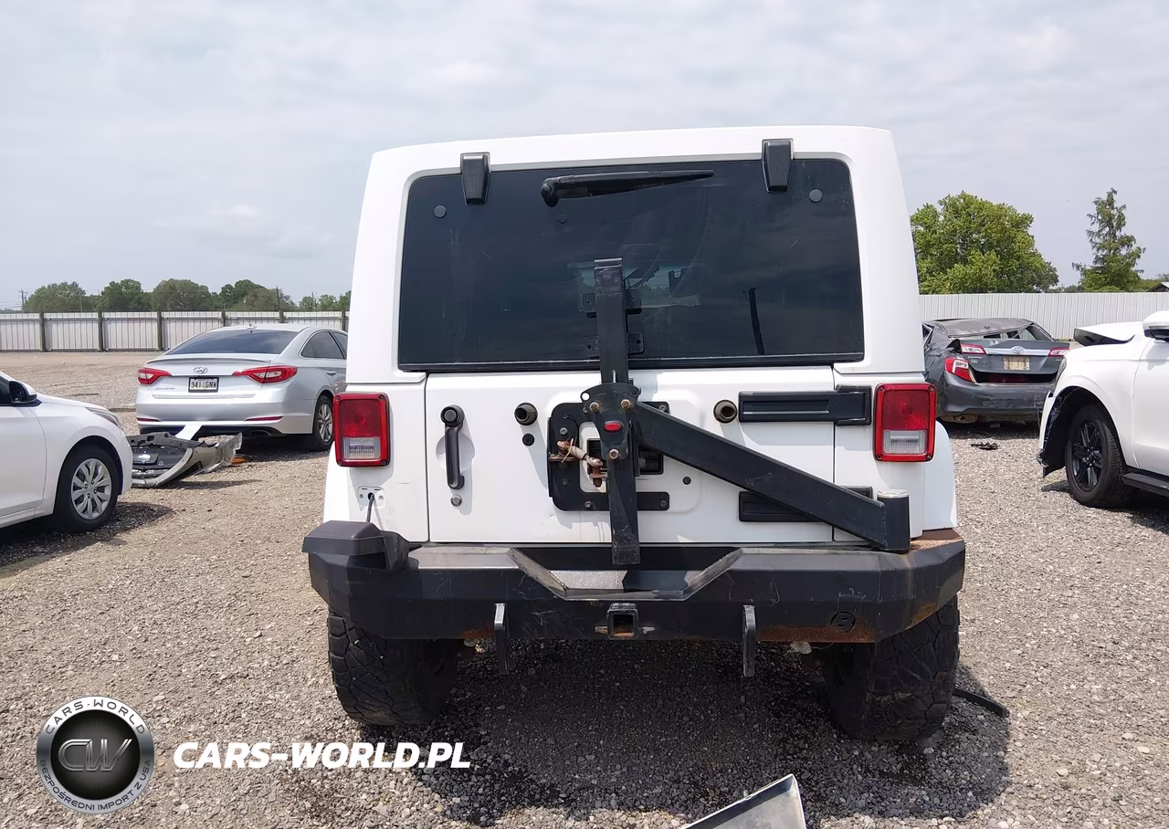 2014 Jeep Wrangler Unlimited Sahara VIN:1C4BJWEG1EL219506 - 17