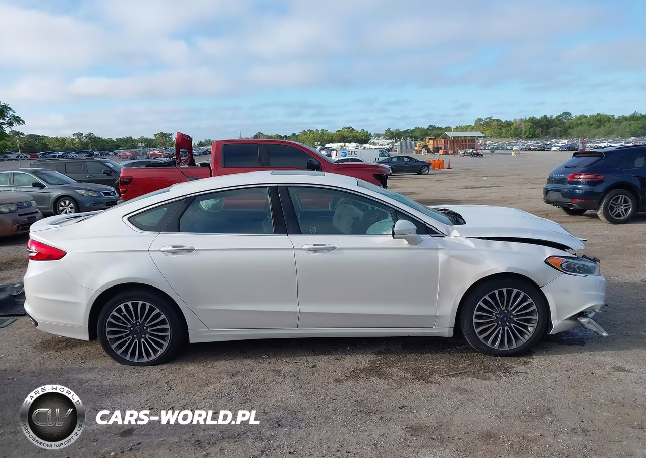 2017 Ford Fusion Titanium VIN:3FA6P0D91HR172523 - 13