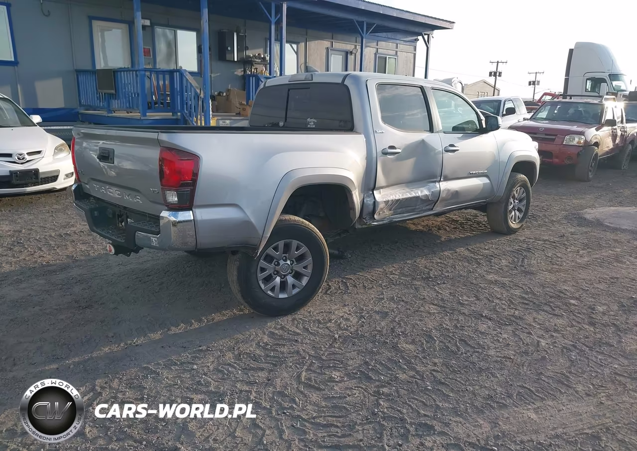 2018 Toyota Tacoma Sr V6 VIN:3TMCZ5AN1JM149705 - 4