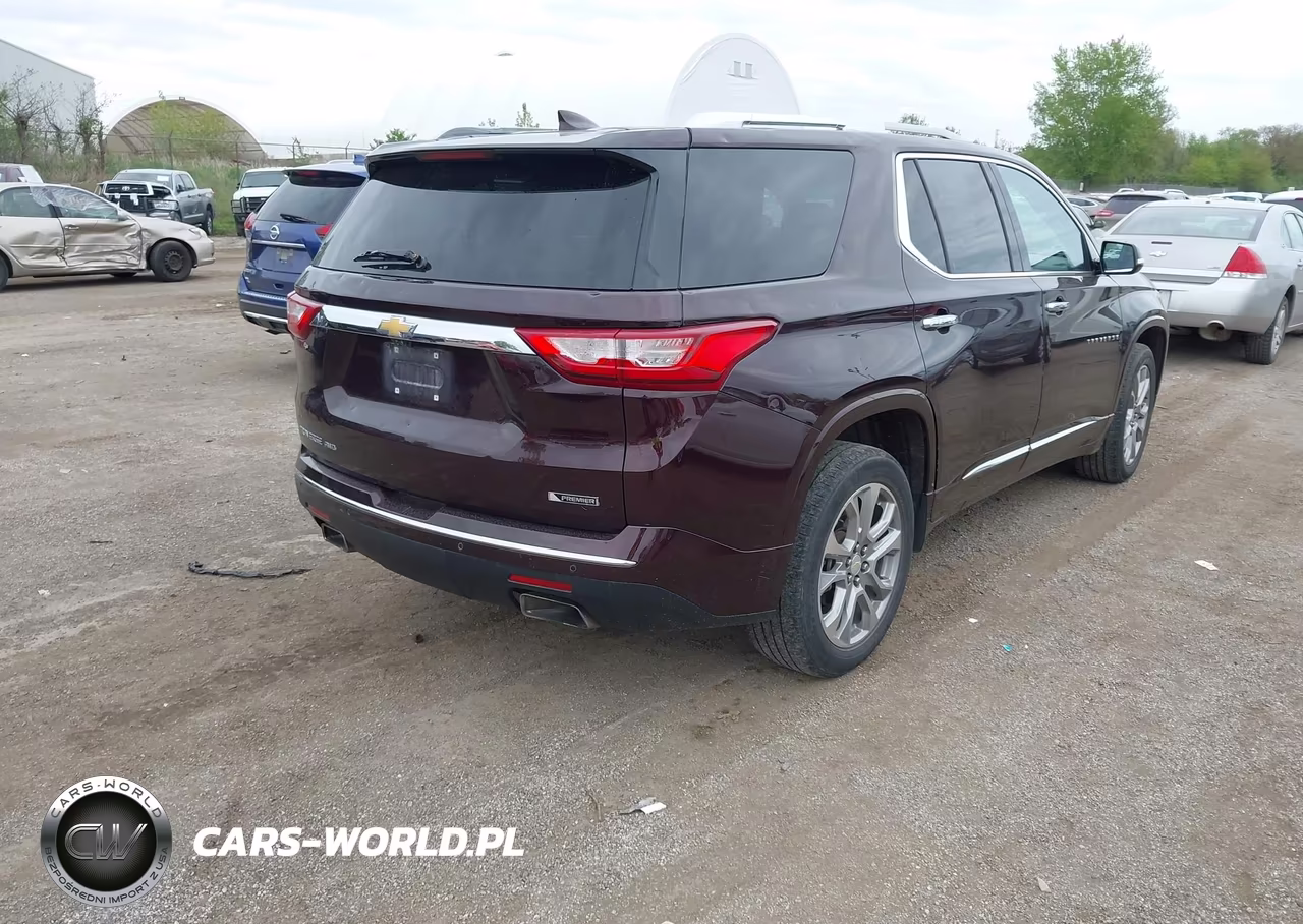2018 Chevrolet Traverse Premier VIN:1GNEVJKW8JJ225011 - 4