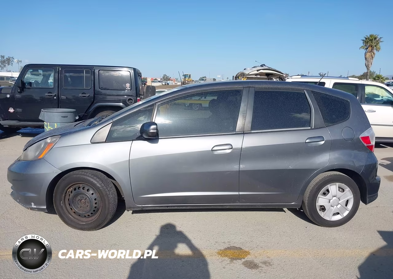 2013 Honda Fit VIN:JHMGE8H31DC015428 - 14