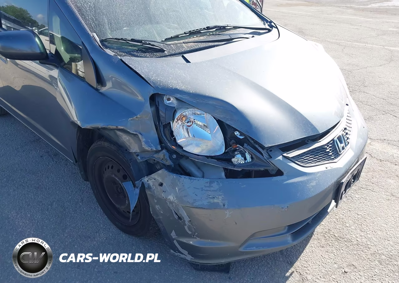 2013 Honda Fit VIN:JHMGE8H31DC015428 - 19