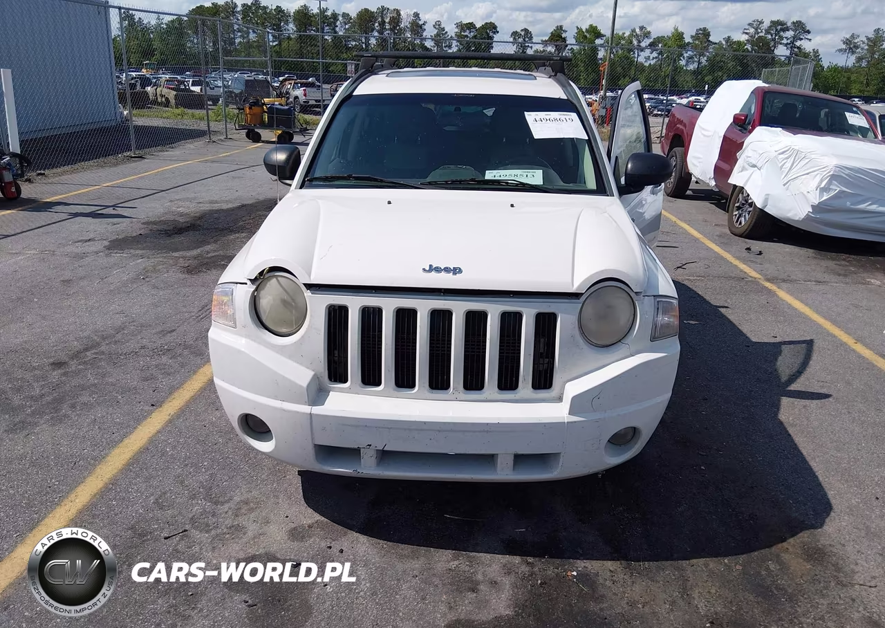 2010 Jeep Compass Sport VIN:1J4NT1FA2AD621716 - 11