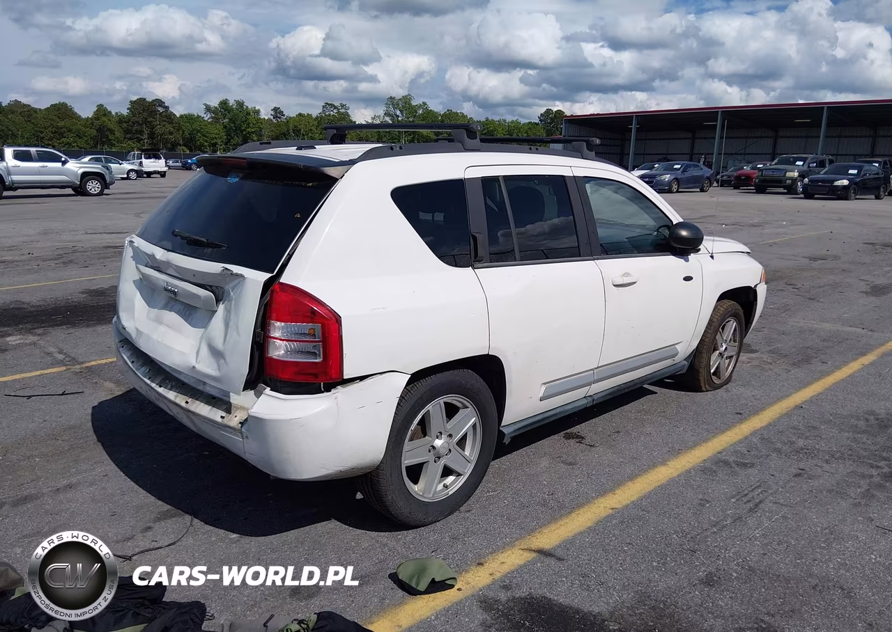 2010 Jeep Compass Sport VIN:1J4NT1FA2AD621716 - 4