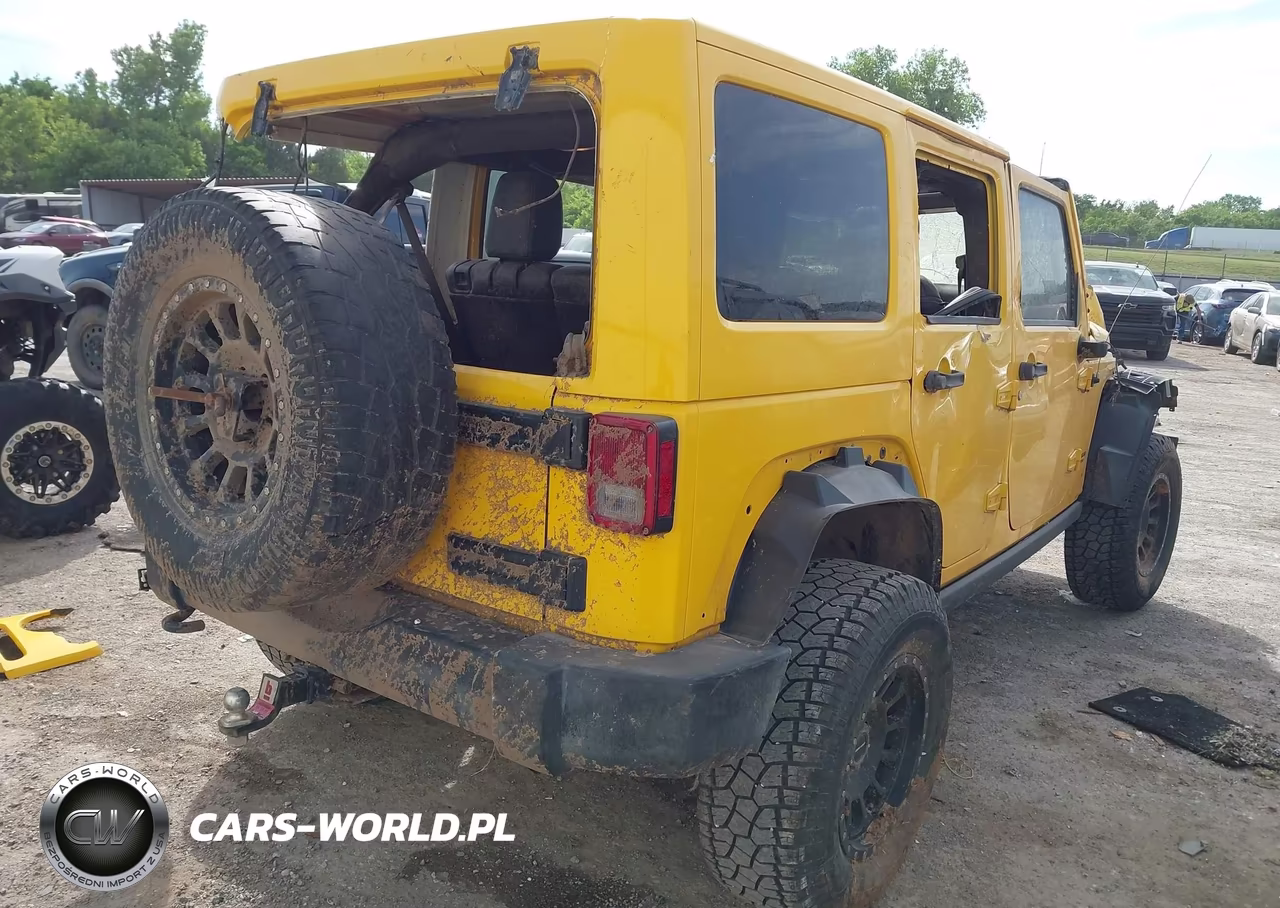 2015 Jeep Wrangler Unlimited Rubicon VIN:1C4HJWFG1FL667058 - 4