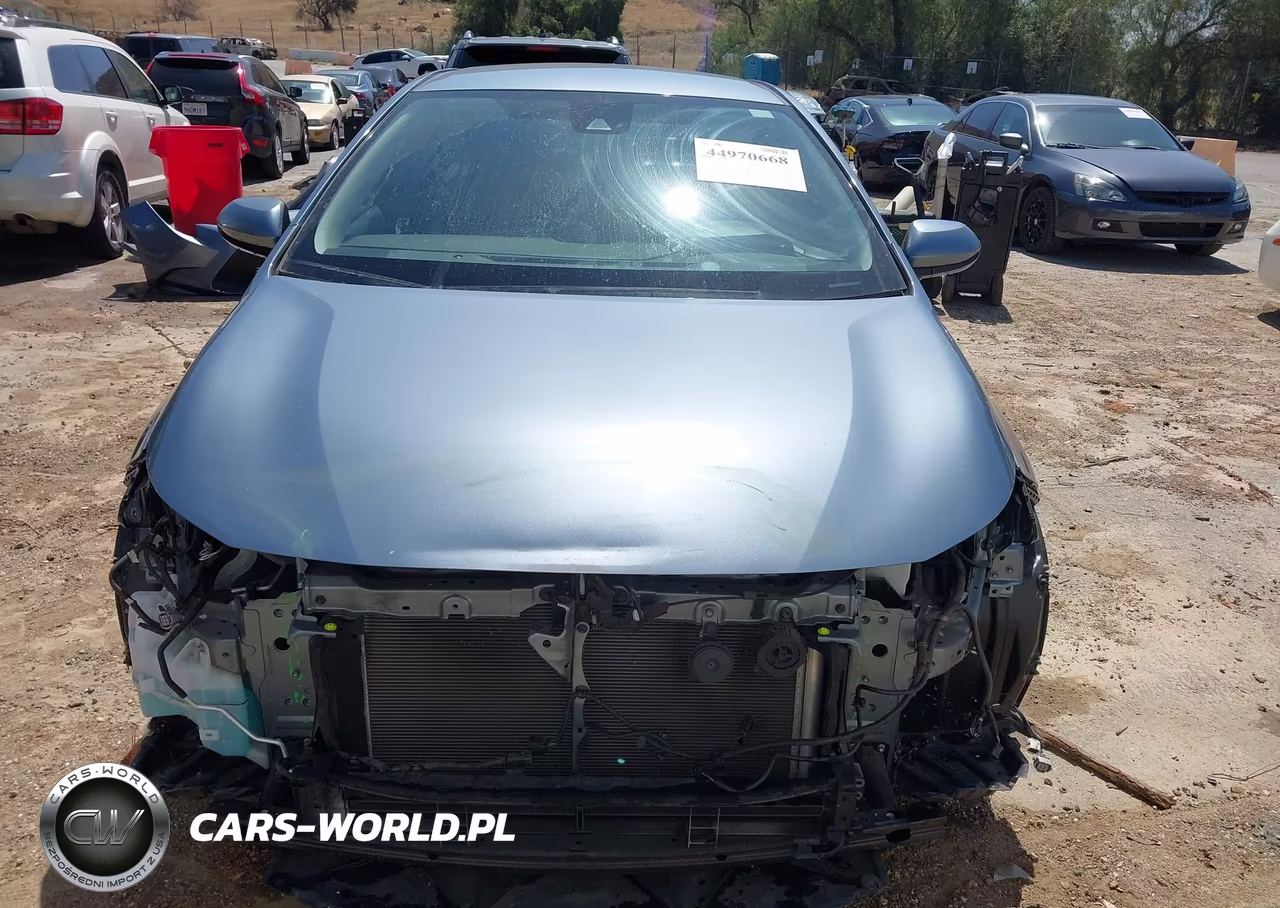 2021 Toyota Corolla Hybrid Le VIN:JTDEAMDE0MJ030650 - 12