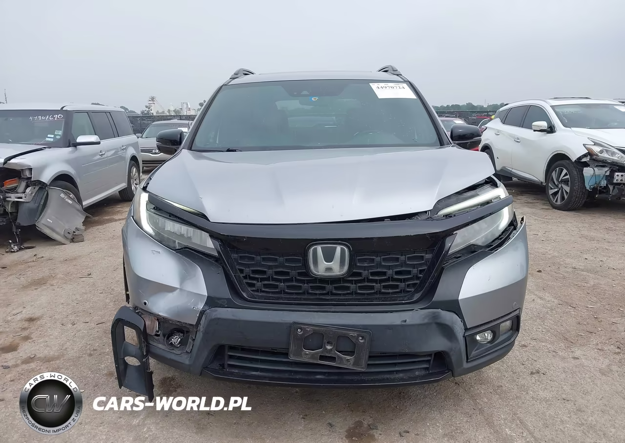 2019 Honda Passport Elite VIN:5FNYF8H02KB016015 - 12