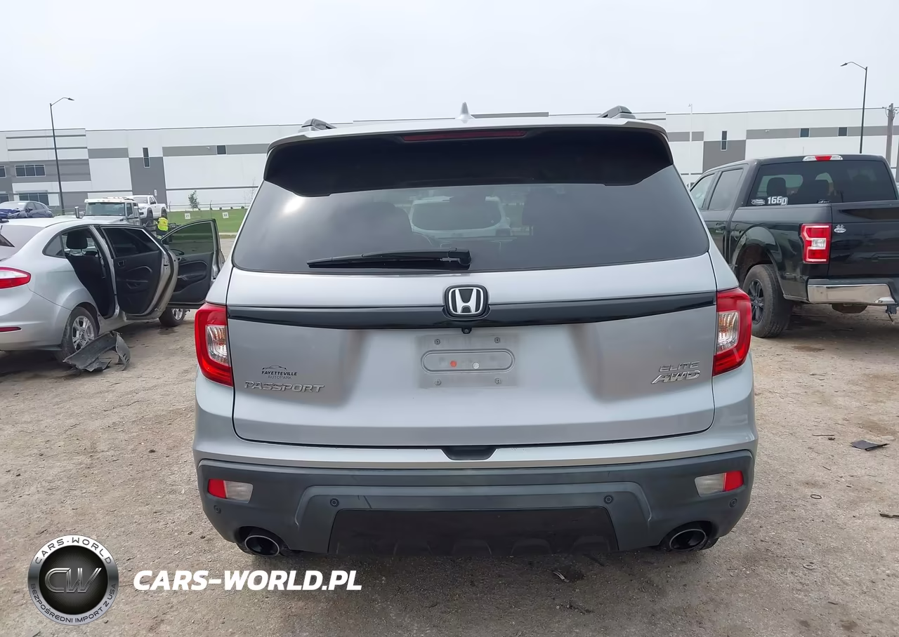 2019 Honda Passport Elite VIN:5FNYF8H02KB016015 - 16