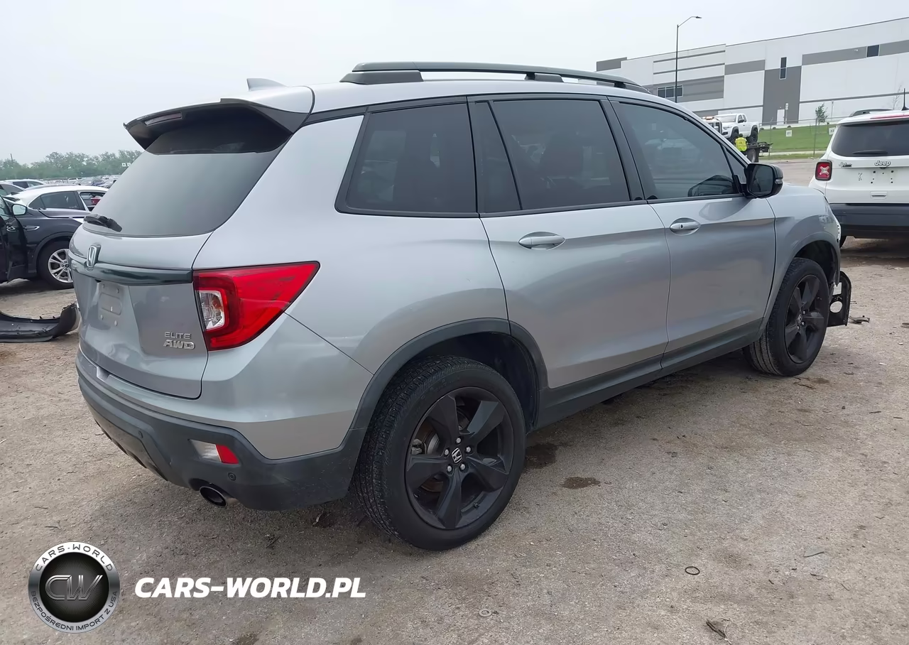 2019 Honda Passport Elite VIN:5FNYF8H02KB016015 - 4