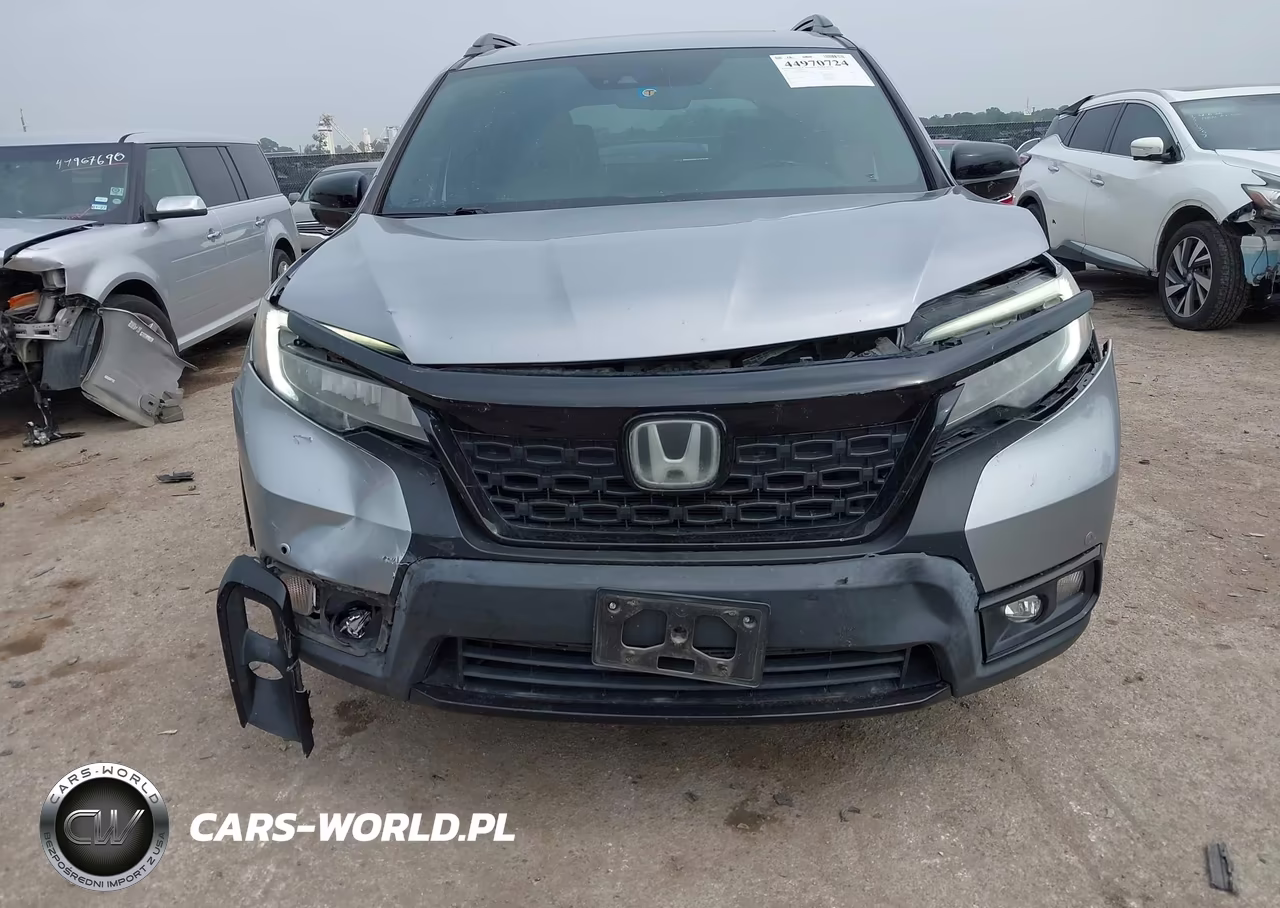 2019 Honda Passport Elite VIN:5FNYF8H02KB016015 - 6
