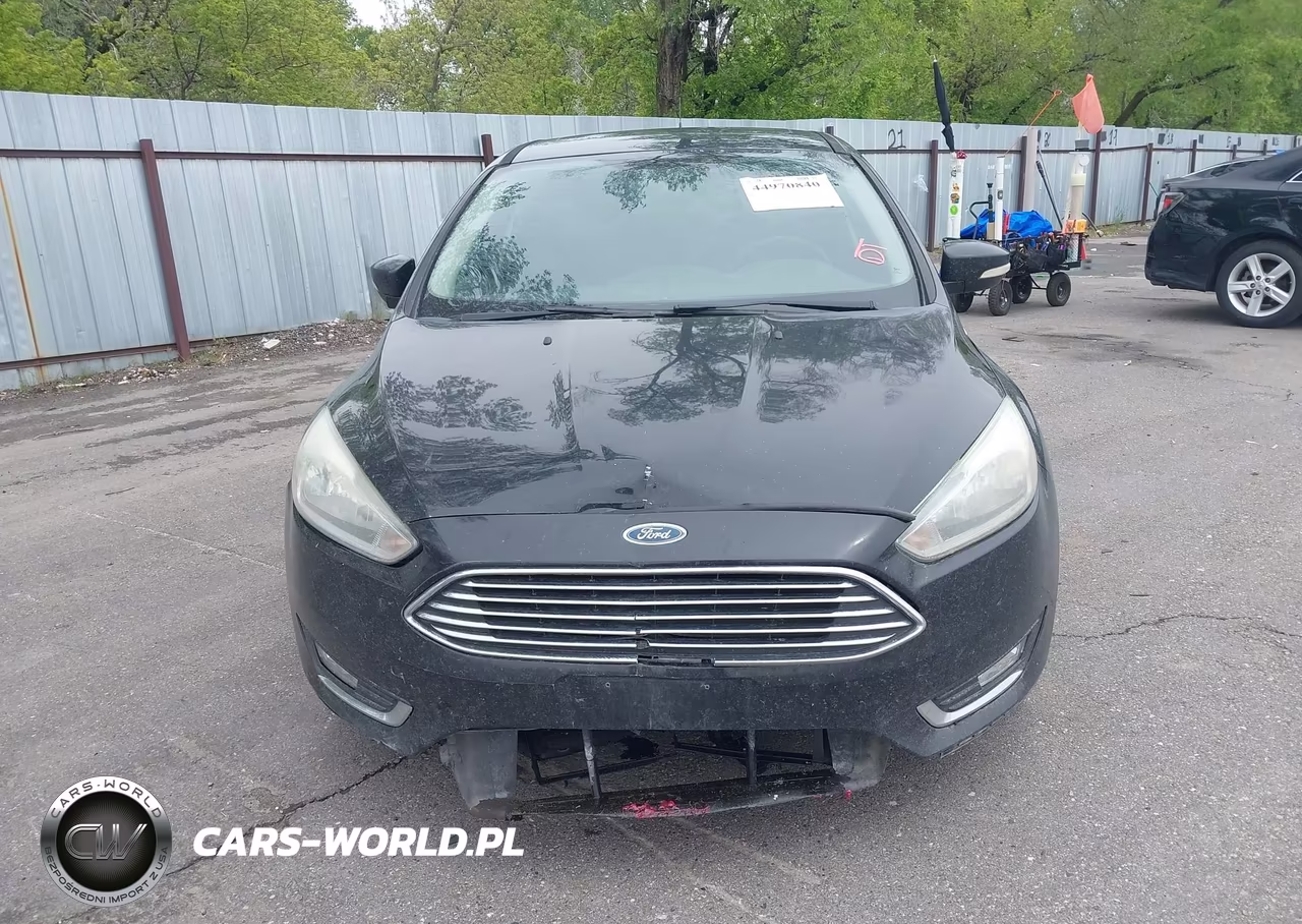 2015 Ford Focus Titanium VIN:1FADP3N29FL293919 - 12