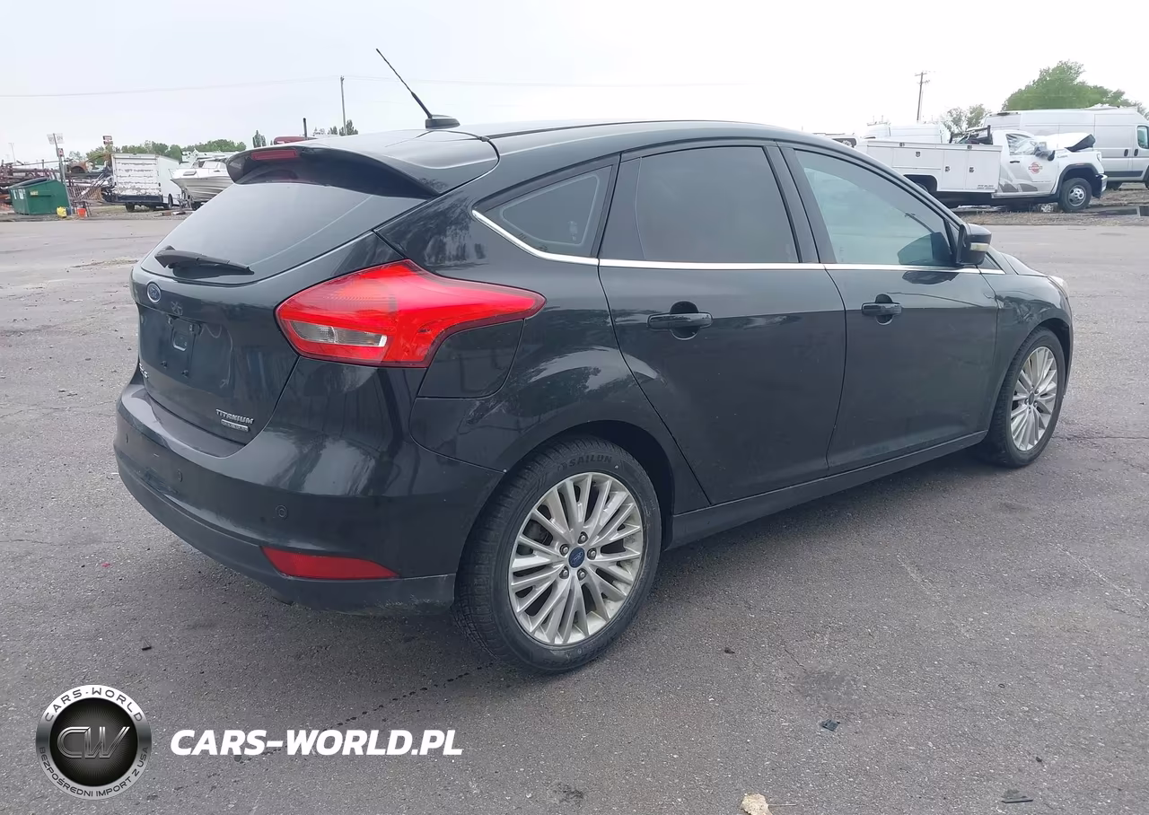 2015 Ford Focus Titanium VIN:1FADP3N29FL293919 - 4