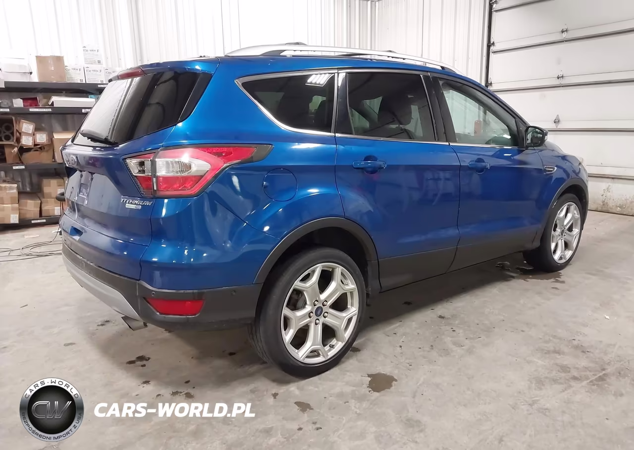 2017 Ford Escape Titanium VIN:1FMCU9J9XHUA73458 - 4