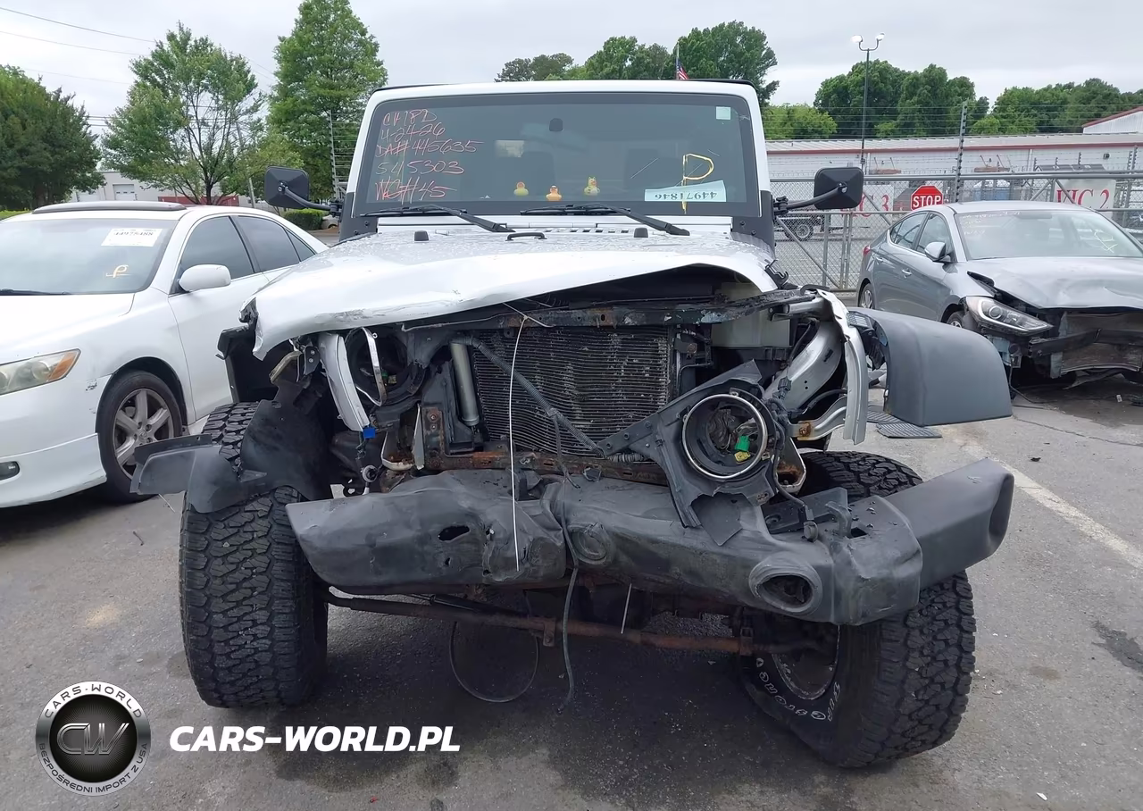 2011 Jeep Wrangler Sport VIN:1J4AA2D17BL545303 - 11