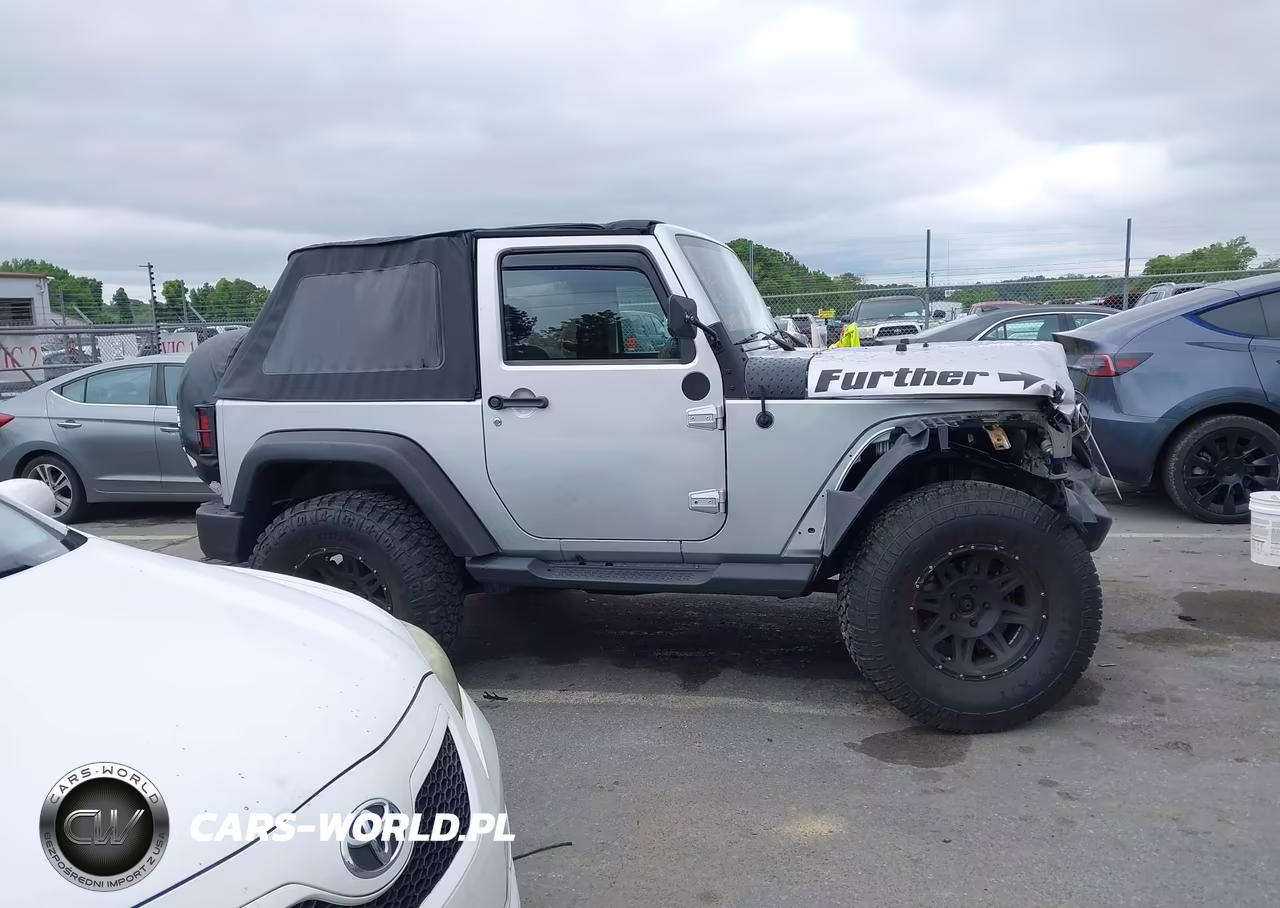 2011 Jeep Wrangler Sport VIN:1J4AA2D17BL545303 - 12