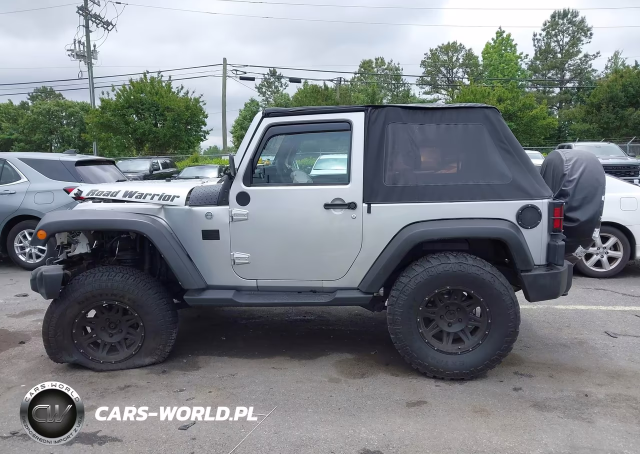 2011 Jeep Wrangler Sport VIN:1J4AA2D17BL545303 - 13