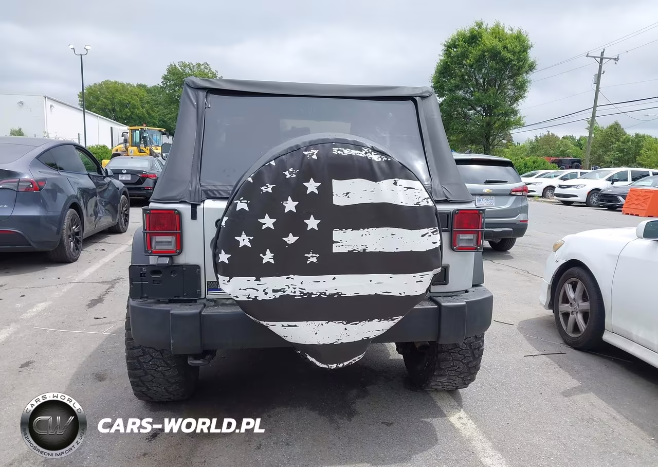 2011 Jeep Wrangler Sport VIN:1J4AA2D17BL545303 - 15