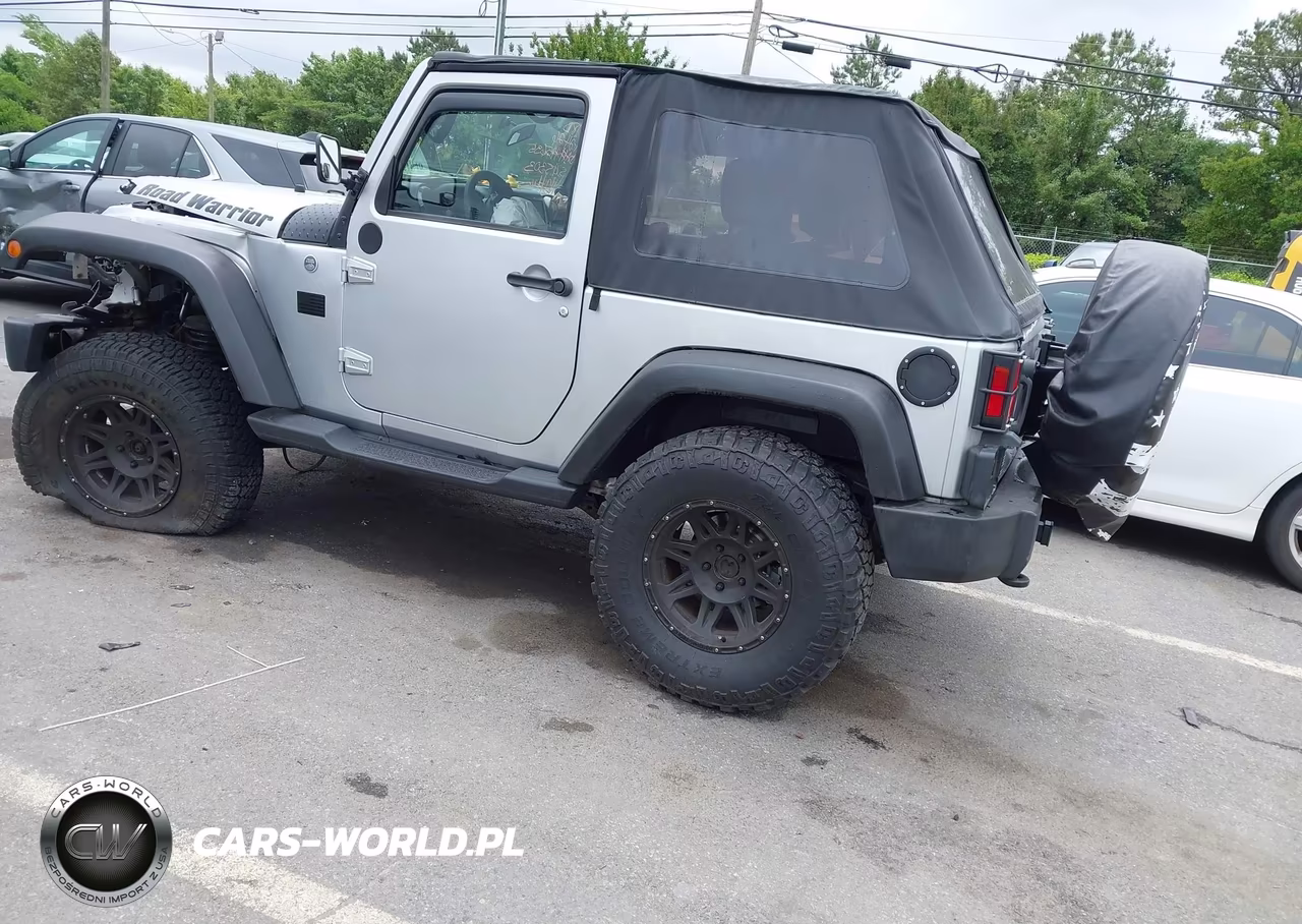 2011 Jeep Wrangler Sport VIN:1J4AA2D17BL545303 - 3