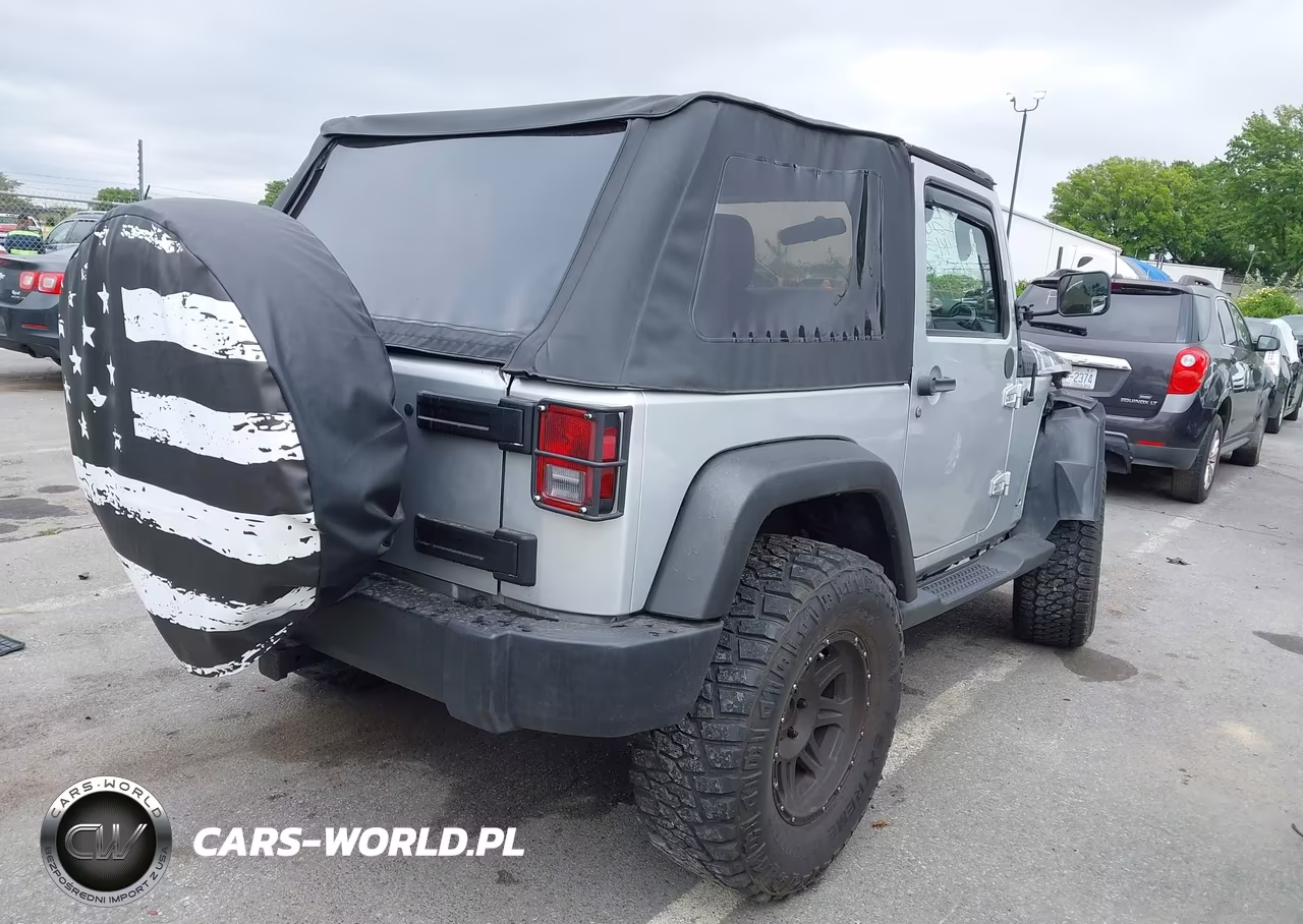 2011 Jeep Wrangler Sport VIN:1J4AA2D17BL545303 - 4