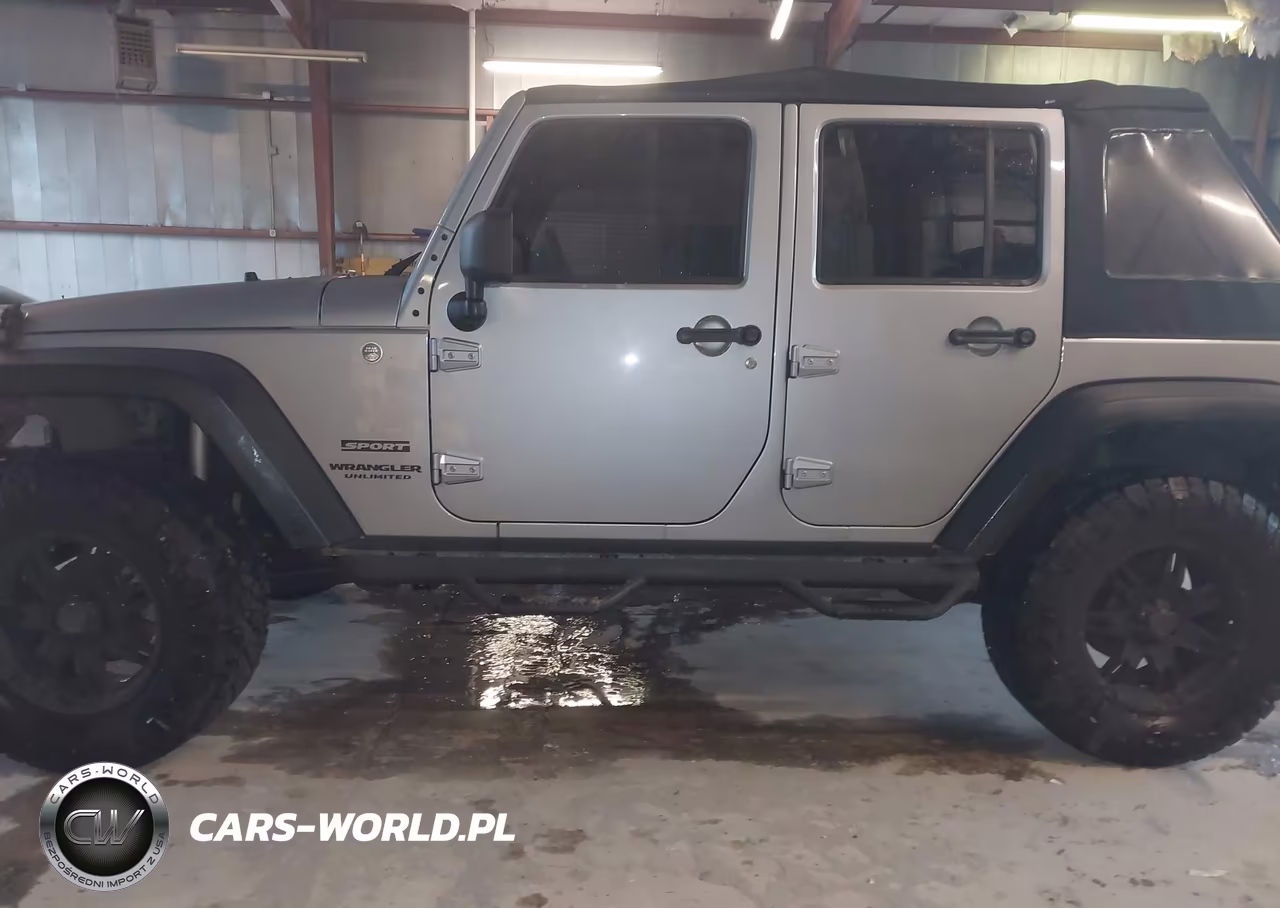 2013 Jeep Wrangler Unlimited Sport VIN:1C4BJWDG2DL704396 - 14