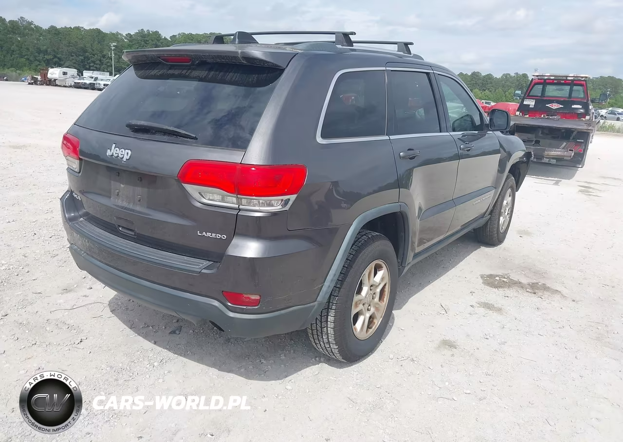 2014 Jeep Grand Cherokee Laredo VIN:1C4RJFAG2EC134730 - 4