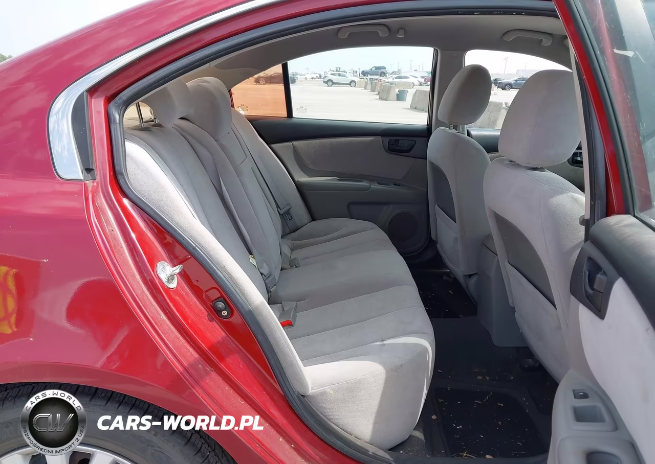 2009 Kia Optima Lx VIN:KNAGE228295322649 - 8