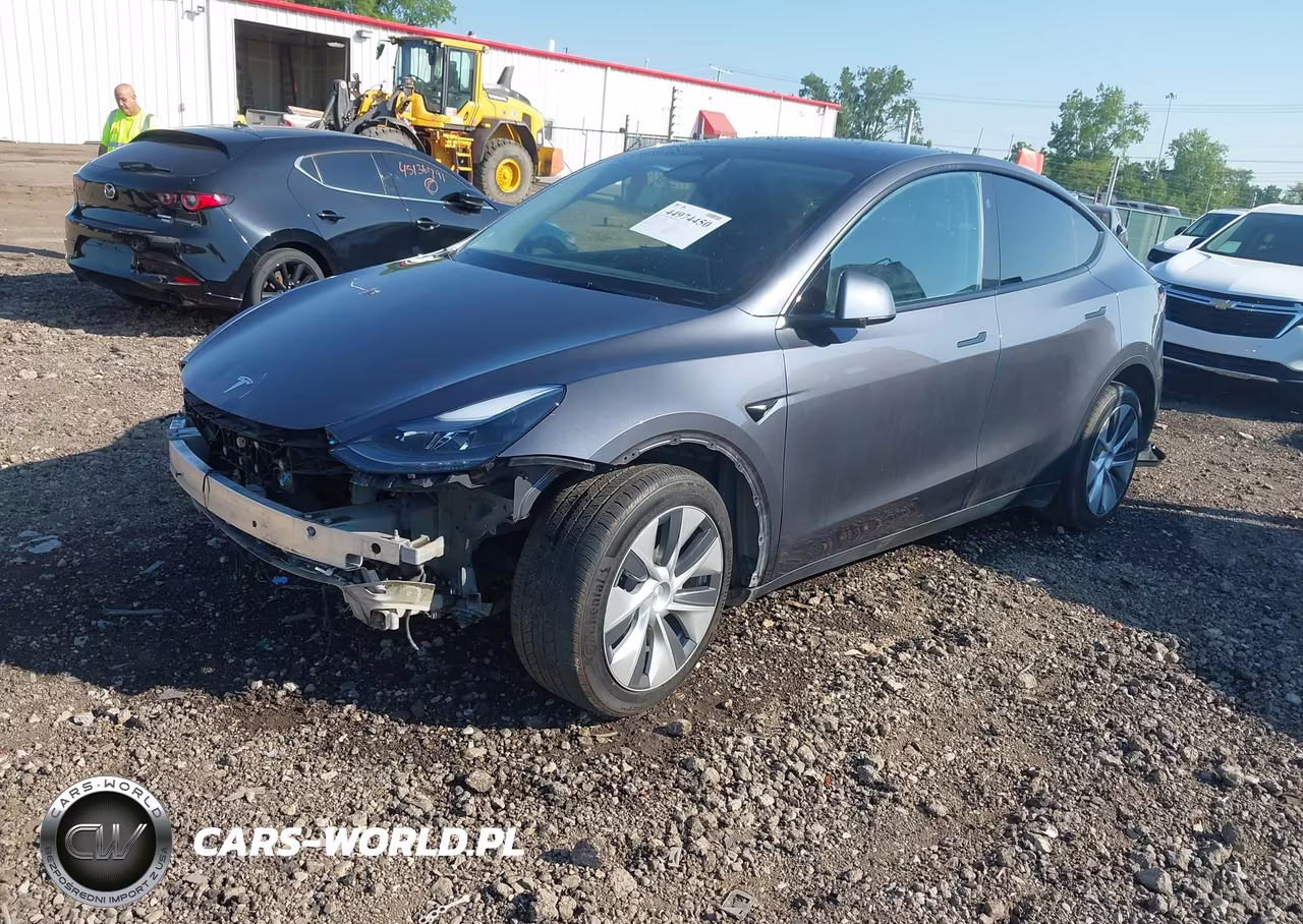 2023 Tesla Model Y Awd-Long Range Dual Motor All-Wheel Drive VIN:7SAYGDEE1PF884457 - 2