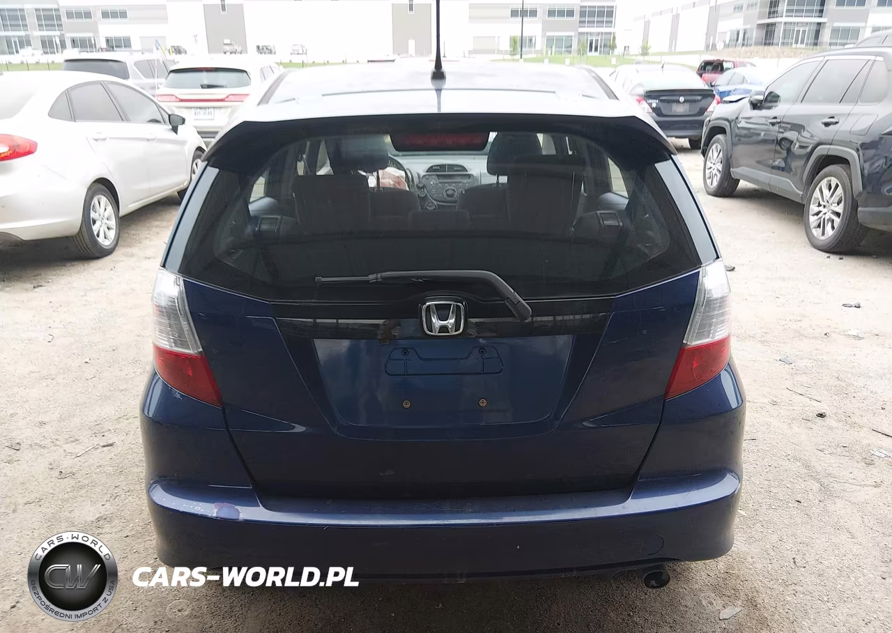 2013 Honda Fit Sport VIN:JHMGE8H55DC044075 - 16