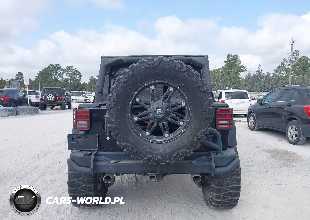 2013 Jeep Wrangler Unlimited Rubicon VIN:1C4BJWFG2DL504647 - 15