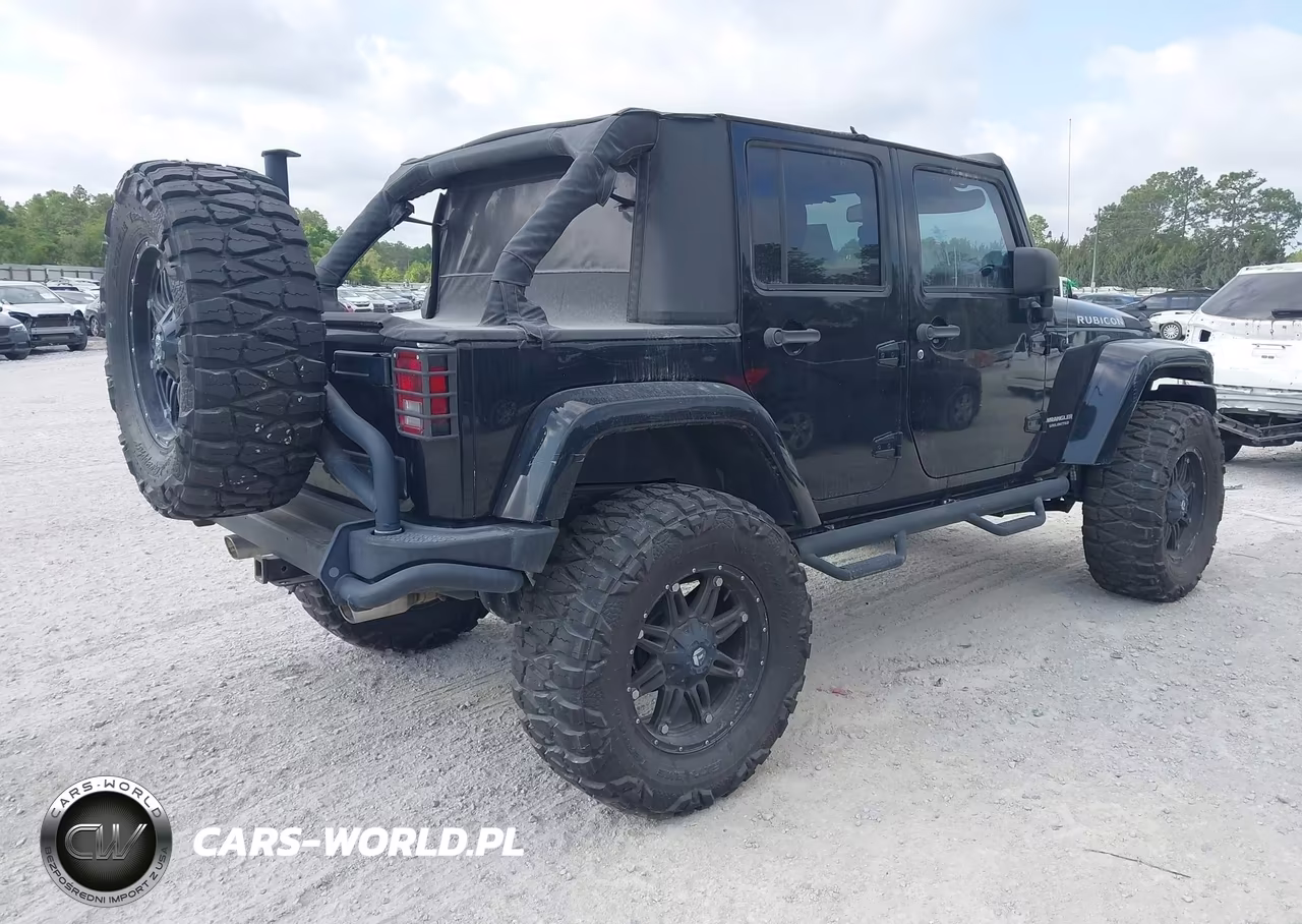 2013 Jeep Wrangler Unlimited Rubicon VIN:1C4BJWFG2DL504647 - 4
