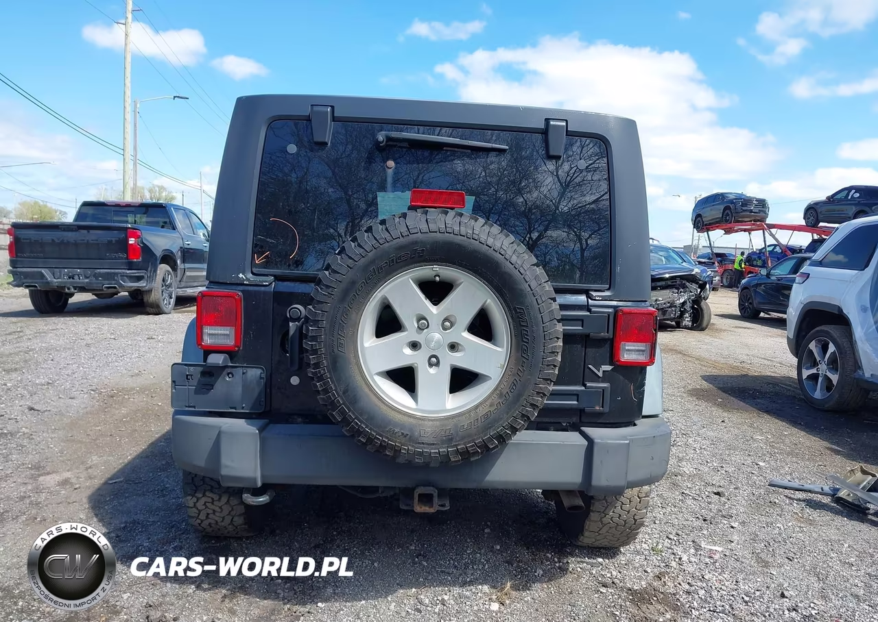 2011 Jeep Wrangler Unlimited Rubicon VIN:1J4BA6H16BL543001 - 16