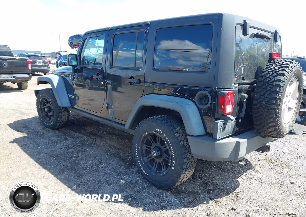 2011 Jeep Wrangler Unlimited Rubicon VIN:1J4BA6H16BL543001 - 3
