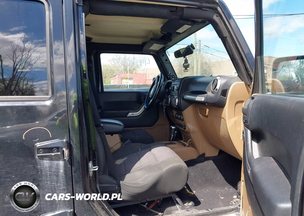 2011 Jeep Wrangler Unlimited Rubicon VIN:1J4BA6H16BL543001 - 5