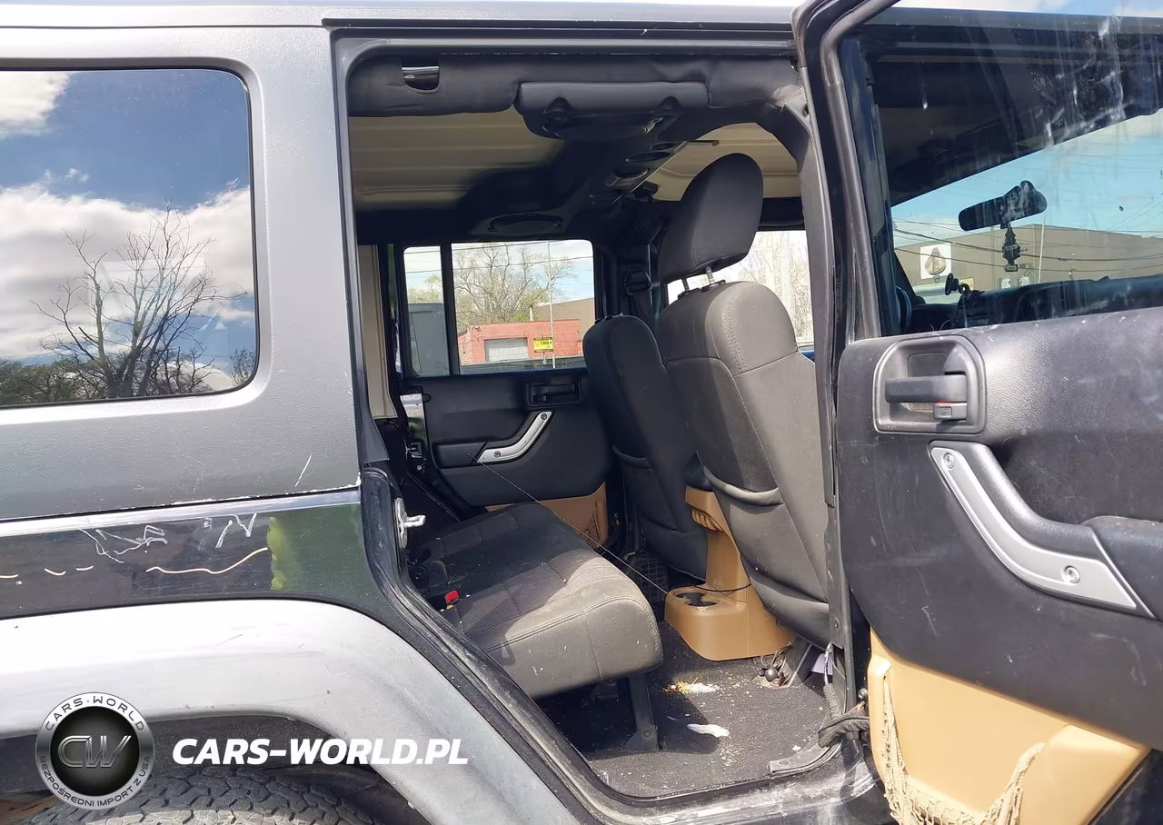 2011 Jeep Wrangler Unlimited Rubicon VIN:1J4BA6H16BL543001 - 8