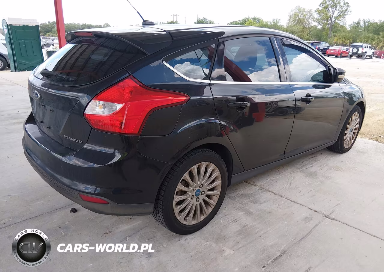 2012 Ford Focus Titanium VIN:1FAHP3N20CL293109 - 4