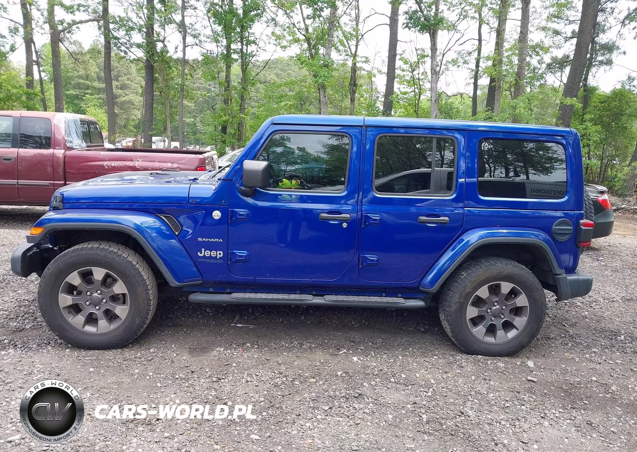 2019 Jeep Wrangler Unlimited Sahara 4X4 VIN:1C4HJXEN2KW506538 - 14