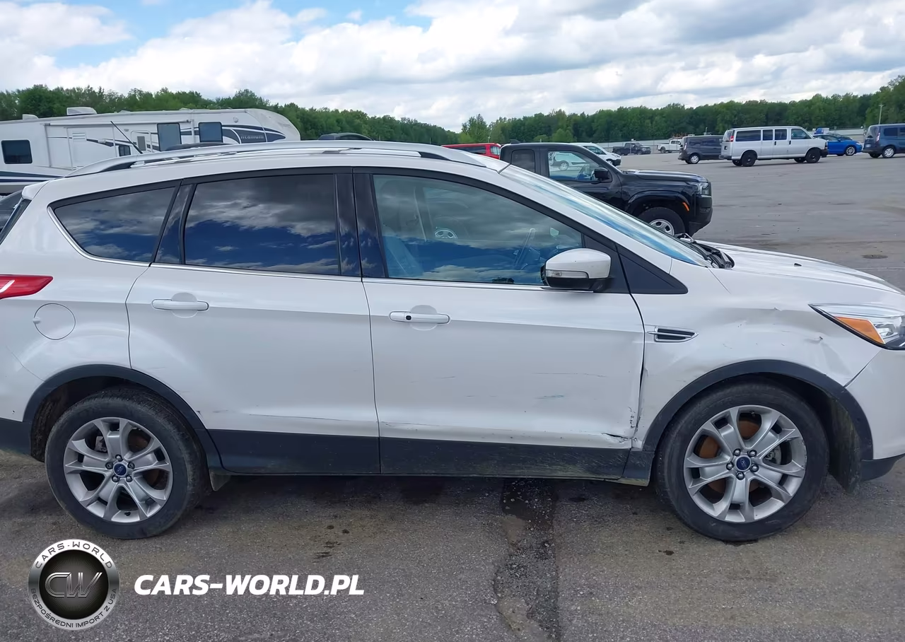 2016 Ford Escape Titanium VIN:1FMCU9J96GUC09910 - 13