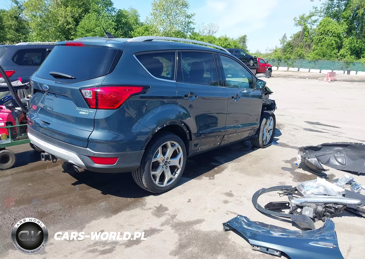 2019 Ford Escape Titanium VIN:1FMCU9J99KUB21636 - 4