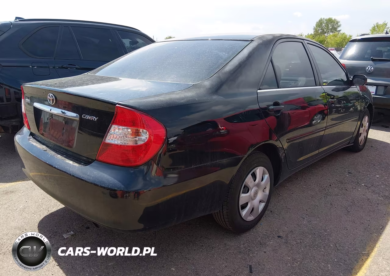 2002 Toyota Camry Le VIN:4T1BE32K22U561477 - 4