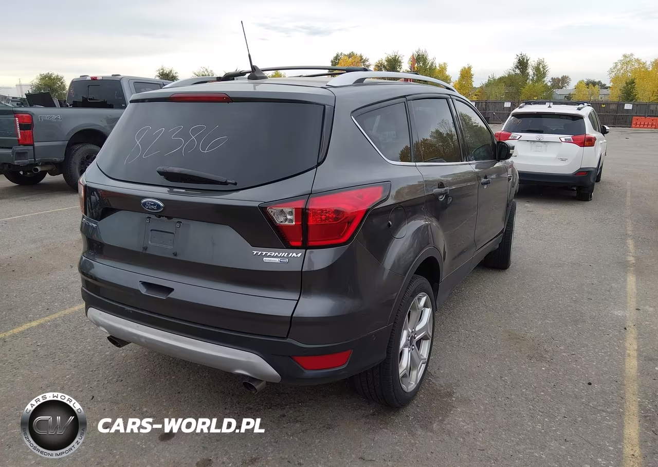 2019 Ford Escape Titanium VIN:1FMCU9J90KUB63015 - 4