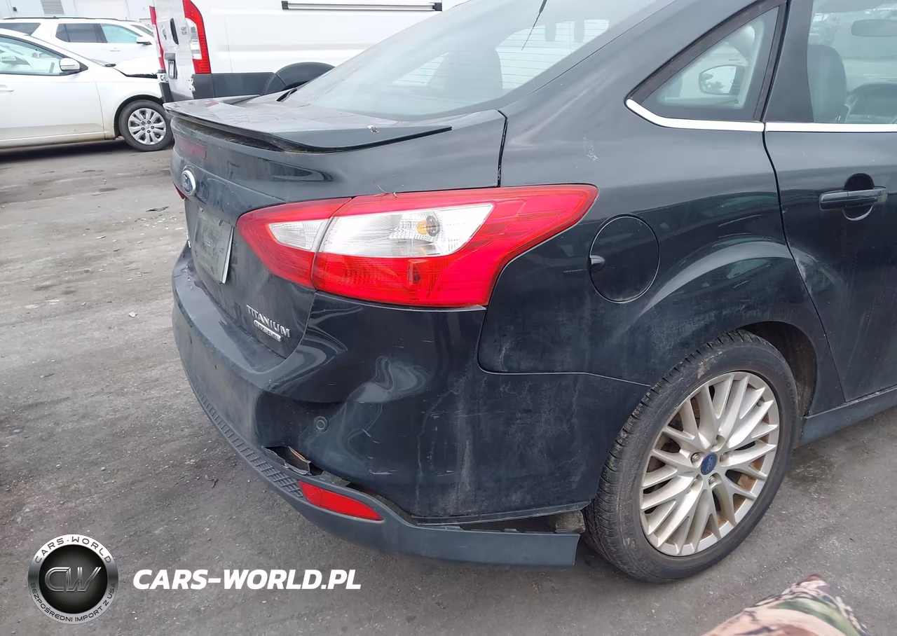 2014 Ford Focus Titanium VIN:1FADP3J25EL189867 - 13