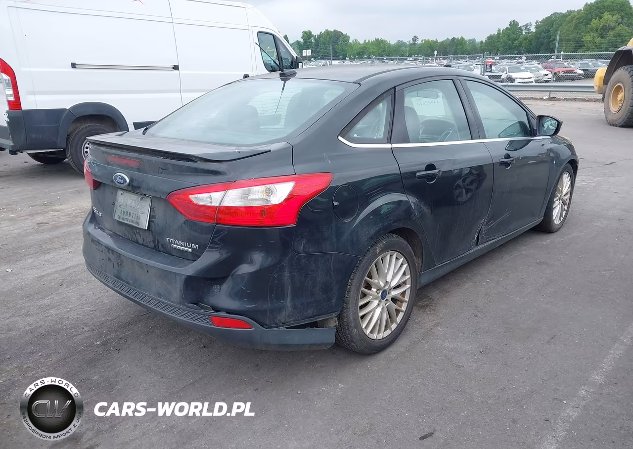 2014 Ford Focus Titanium VIN:1FADP3J25EL189867 - 4