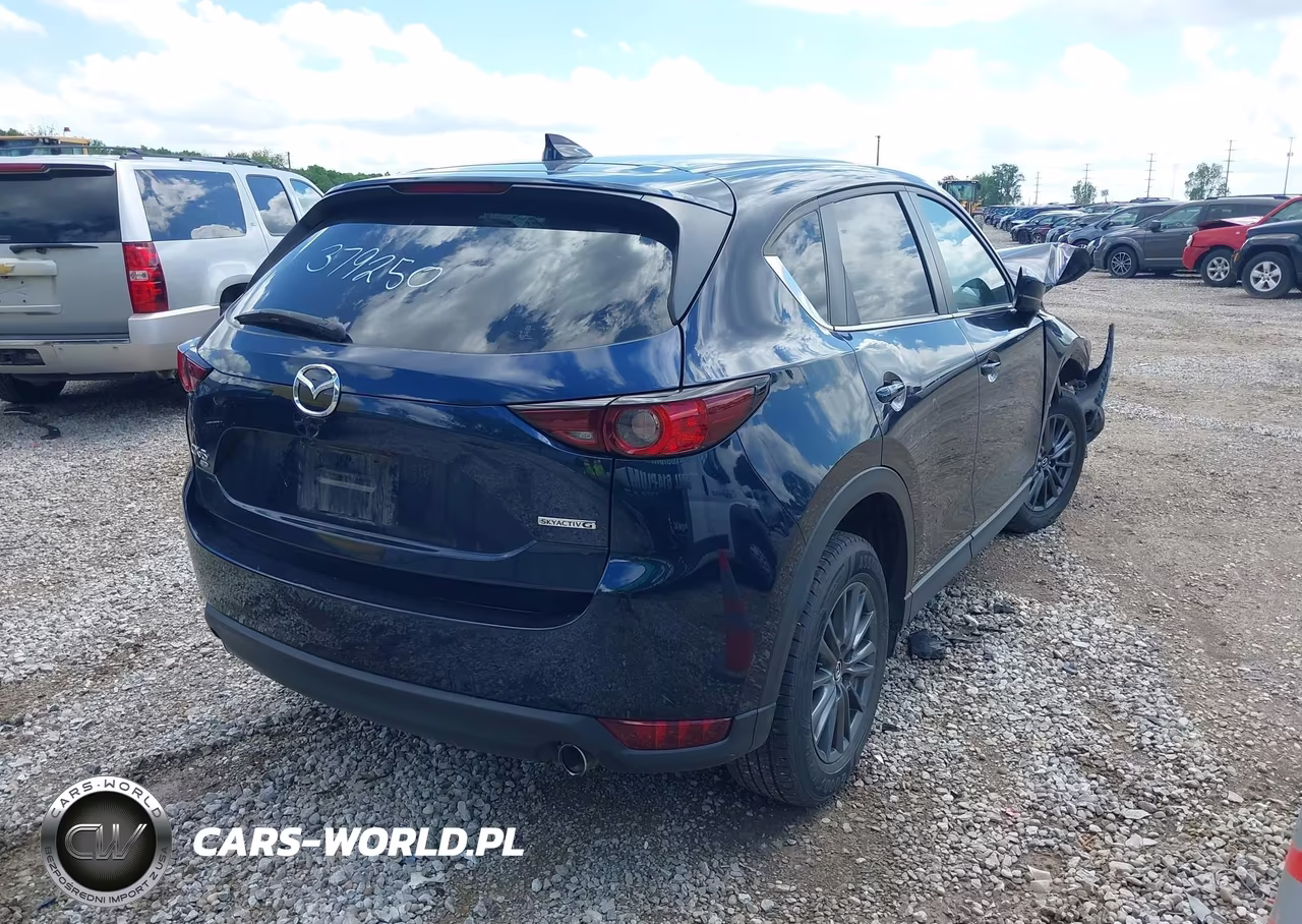 2021 Mazda Cx-5 Touring VIN:JM3KFBCM7M1379250 - 4