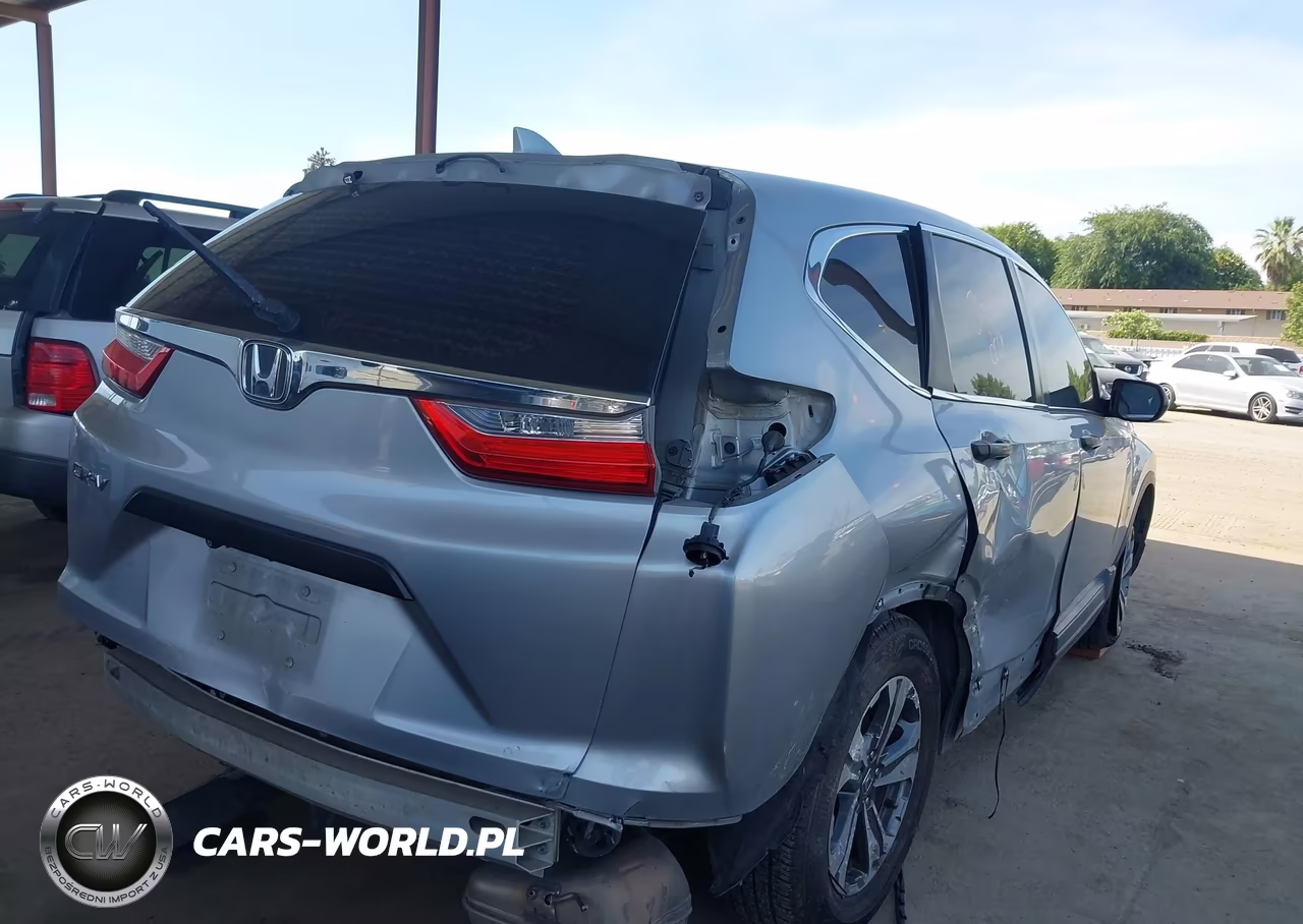 2018 Honda Cr-V Lx VIN:2HKRW5H39JH414335 - 4