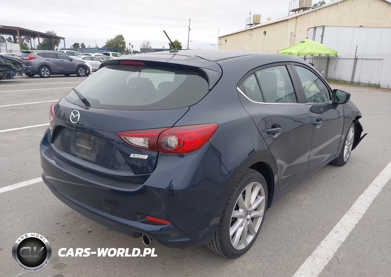 2017 Mazda Mazda3 Touring VIN:3MZBN1L71HM141674 - 4