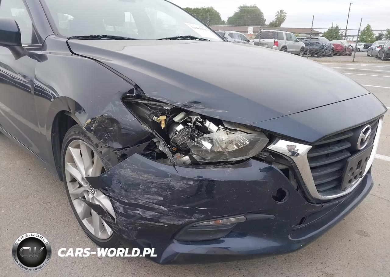 2017 Mazda Mazda3 Touring VIN:3MZBN1L71HM141674 - 6