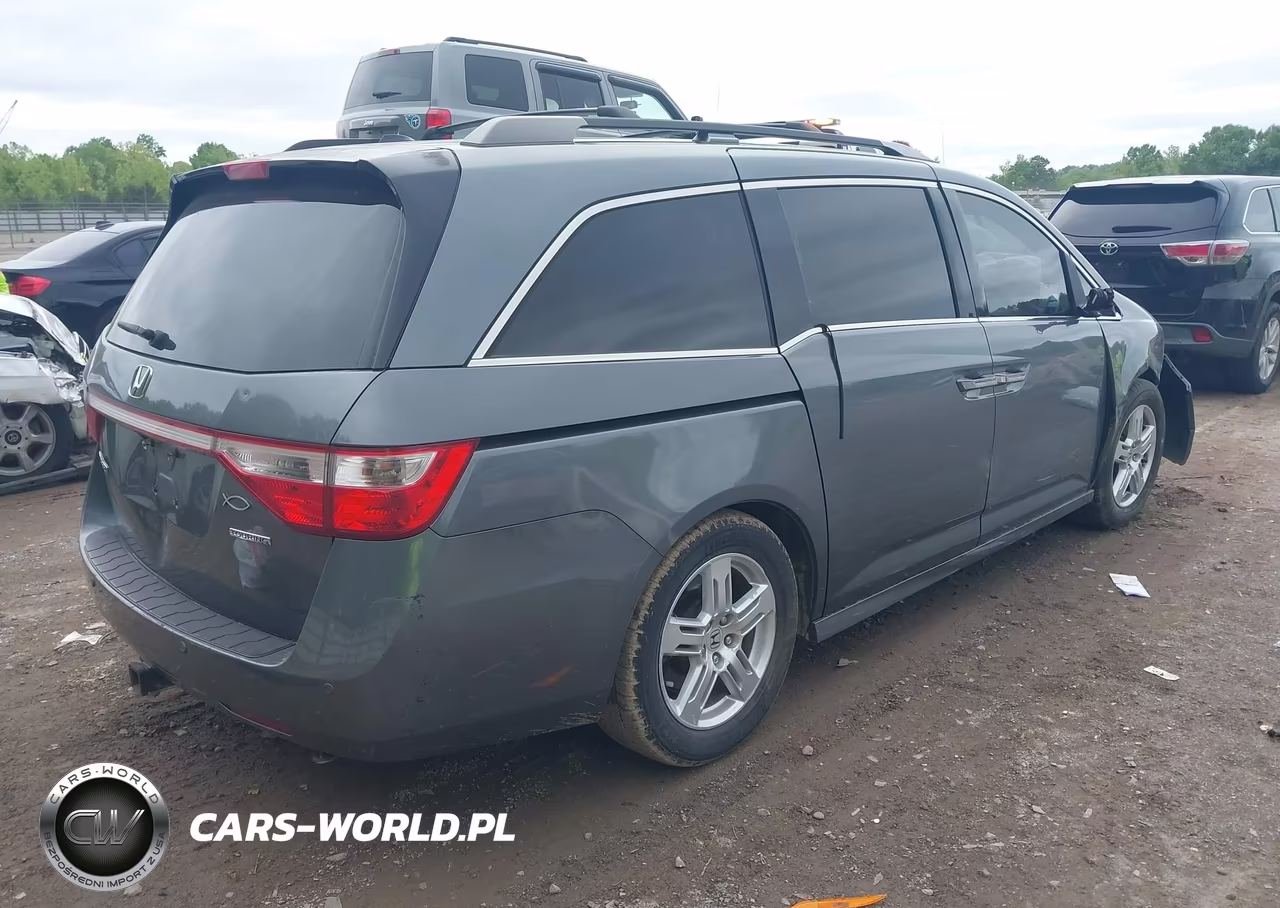 2011 Honda Odyssey Touring-Touring Elite VIN:5FNRL5H95BB031196 - 4