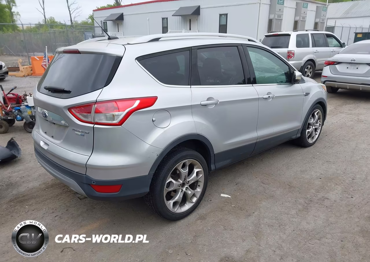 2015 Ford Escape Titanium VIN:1FMCU9J95FUB00322 - 4