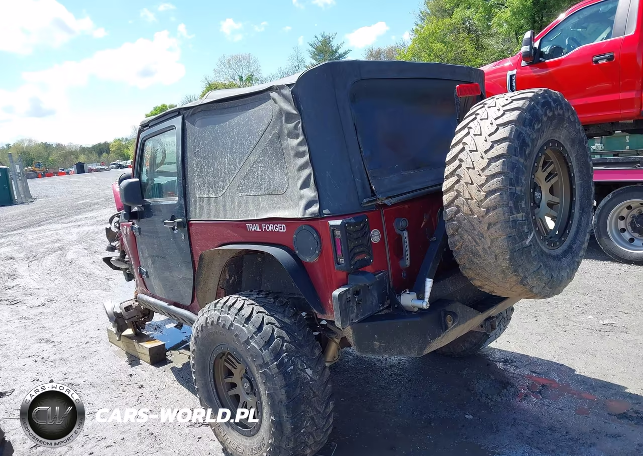 2011 Jeep Wrangler Sport VIN:1J4AA2D19BL569571 - 3